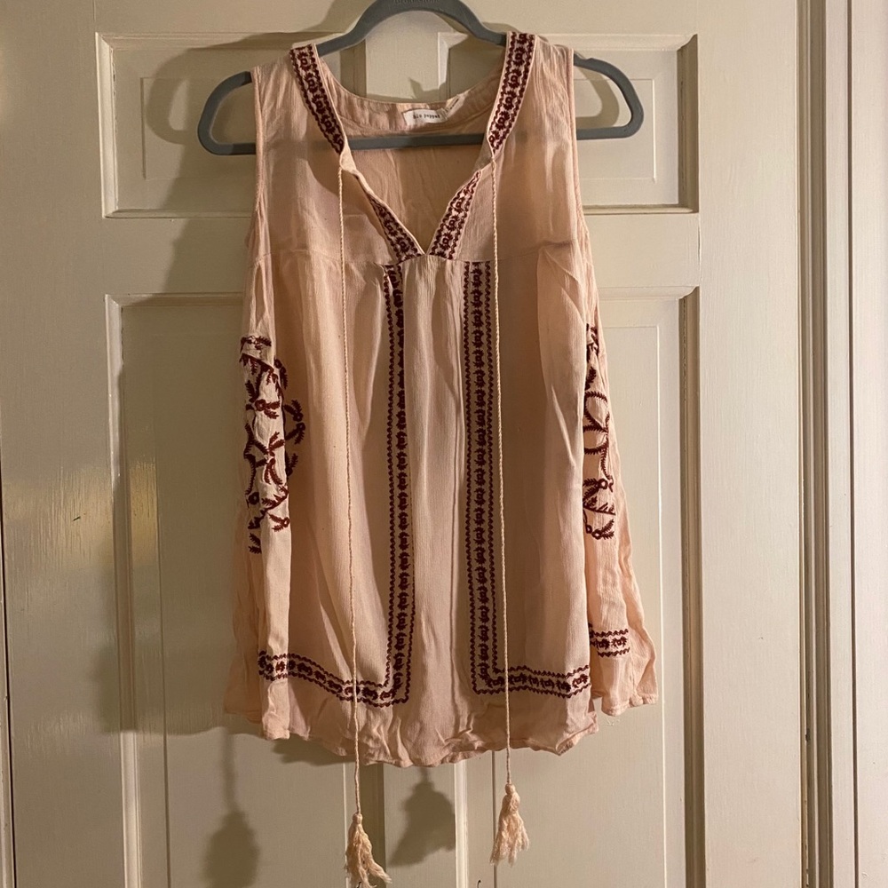 tasseled tank with embroidered detailing